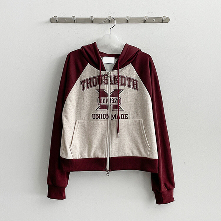 レタリングバイカラーラグランフードダブルジップアップ