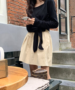 ミニスカート フェミニンシャーリングミニスカート FLAT BEIGE