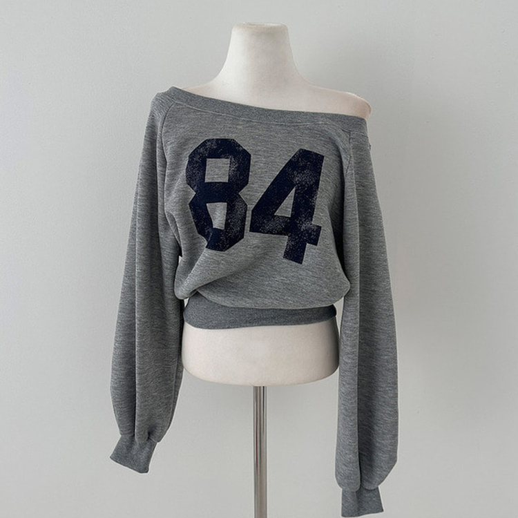 【起毛】84レタリングオフショルダークロップトレーナー