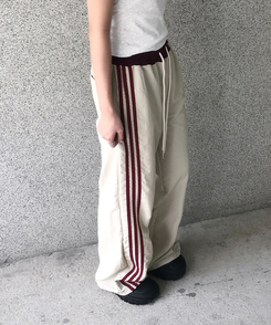 バイカラーラインナイロントレーニングワイドパンツ BEIGE