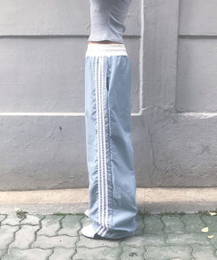 バイカラーラインナイロントレーニングワイドパンツ SKY BLUE