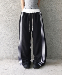 バイカラーラインナイロントレーニングワイドパンツ BLACK