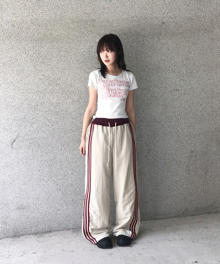 バイカラーラインナイロントレーニングワイドパンツ BEIGE