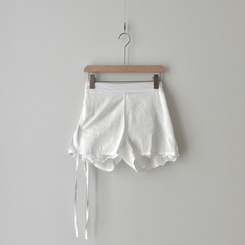 パンチングストラップミニスカートパンツ