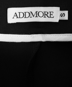 バックルラップレイヤードブーツカットスラックス