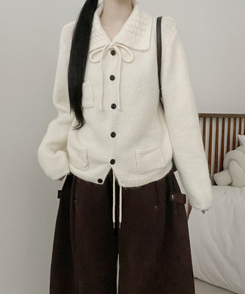 썸포켓꽈배기카라리본스트랩루즈핏니트가디건 아이보리