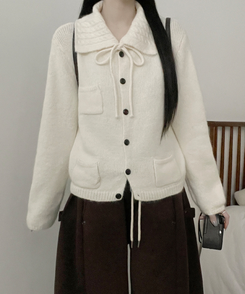 썸포켓꽈배기카라리본스트랩루즈핏니트가디건 아이보리