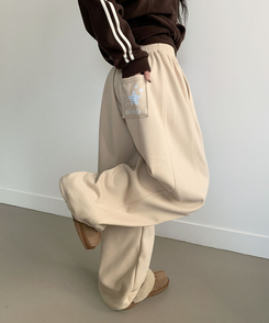 MADE특가 위시 융기모 유니크 엔젤스타 프린팅 사이드 절개 밑단 스트링 롱 와이드 트레이닝 팬츠 연베이지