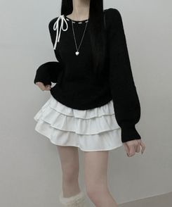 퍼린리본스티치보트넥세미크롭루즈핏니트 검정