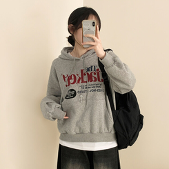 【起毛】バイカラーレタリングルーズフード MELANGE