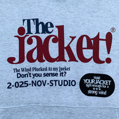 【起毛】バイカラーレタリングルーズフード