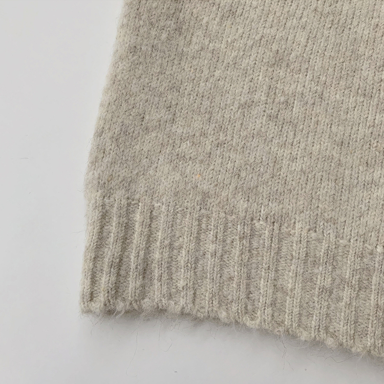 ラウンドボタンオーバーニット