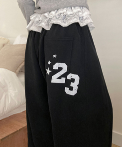 ビンテージレタリングスリットラインワイドトレーニングパンツ VINTAGE BLACK