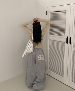 レタリングワイドトレーニングパンツ MELANGE