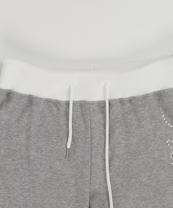 バイカラーレタリングトレーニングパンツ