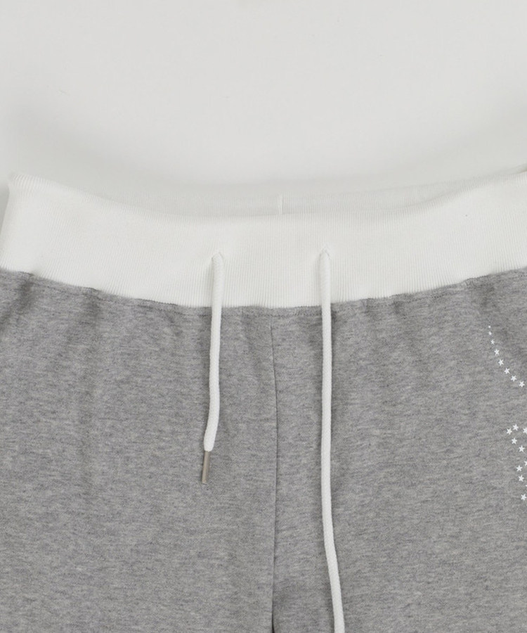 バイカラーレタリングトレーニングパンツ