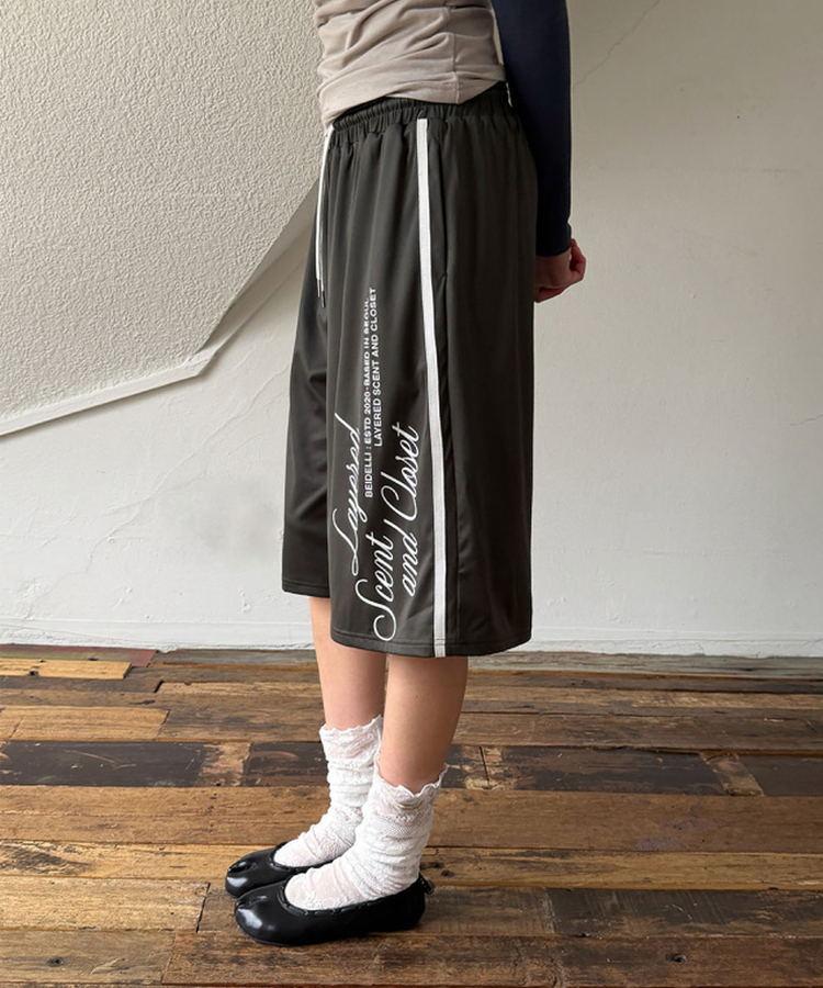 レタリングナイロントラックラインパンツ KHAKI