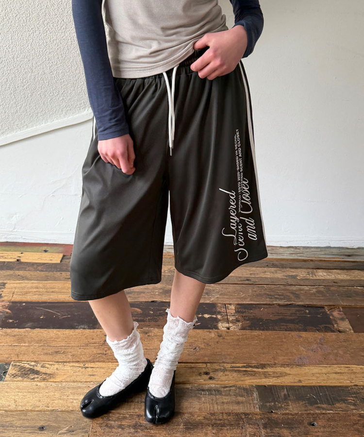 レタリングナイロントラックラインパンツ KHAKI