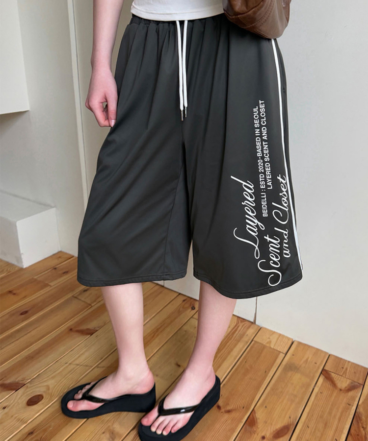 レタリングナイロントラックラインパンツ KHAKI