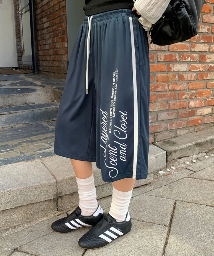 レタリングナイロントラックラインパンツ NAVY