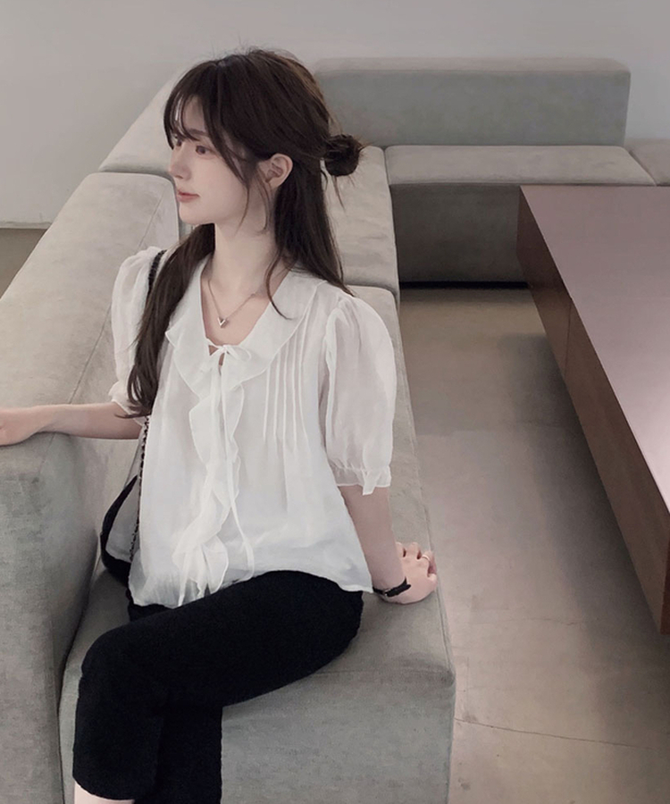 사랑스러움을 블라우스로 만든다면멜로아 셔링 퍼프 반팔 썸머 루즈핏 리본 블라우스 아이보리