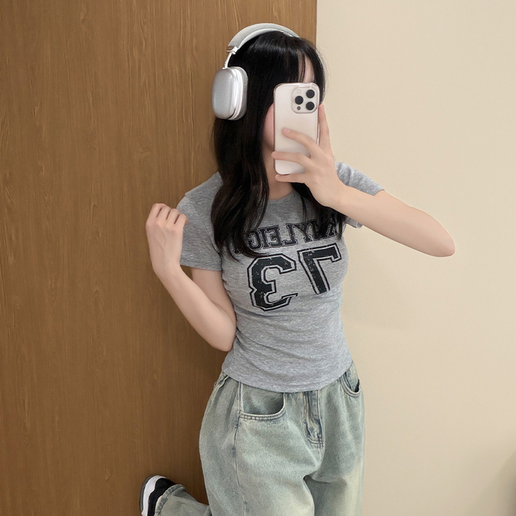 ラウンドサイドシャーリングレタリングTシャツ MELANGE