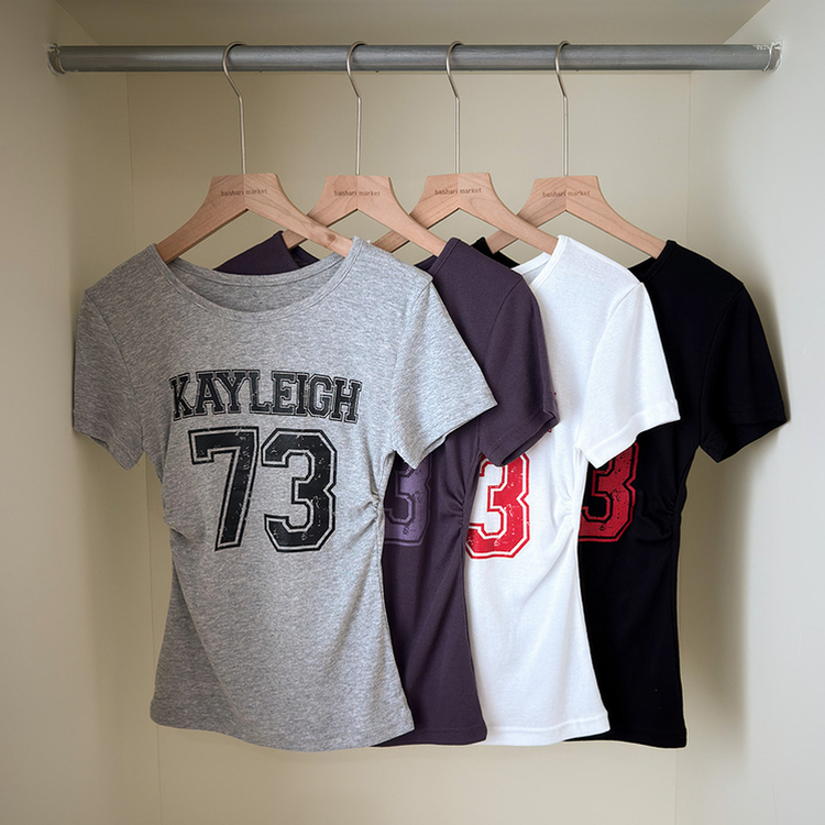 ラウンドサイドシャーリングレタリングTシャツ