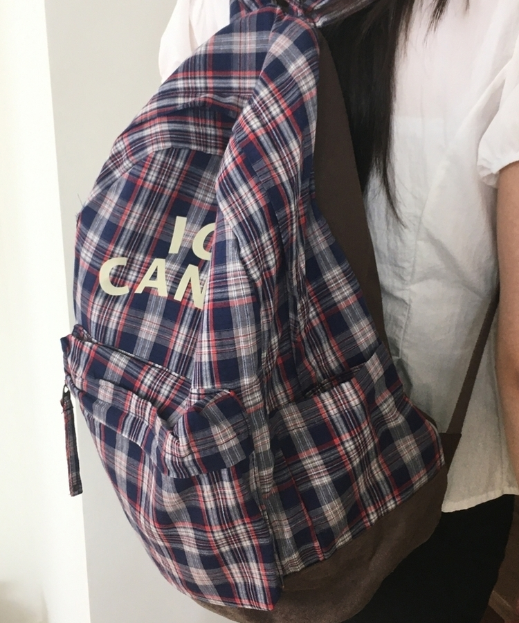 レタリングチェック大容量バックパック NAVY