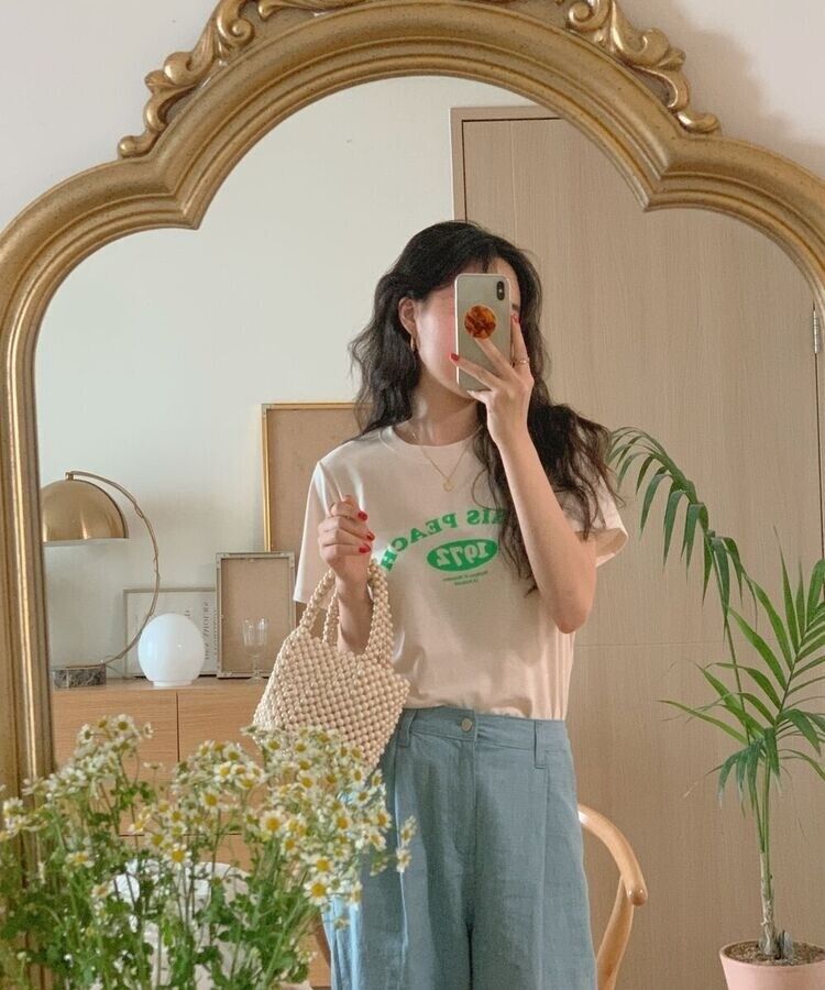 英文プリントルーズフィット半袖Tシャツ CREAM